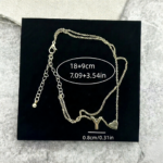 Woman wearing a Letter Y Heart Anklet with a double-layer chain and heart charm