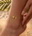 Woman wearing a Letter N Heart Anklet with double layer chain and heart charm