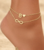 Double layer ankle bracelet featuring an Infinity symbol and a letter B charm on a woman's ankle