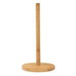 A standing light-colored wooden paper towel holder standing on a kitchen counter.
