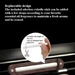 Round wooden car essential oil diffuser with magnetic lid and silicone-protected vent clip.