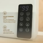 Large white electrical aroma humidifier with remote control, 38.5cm height.