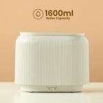 Black electric aroma diffuser with orange LED flame-effect mist.