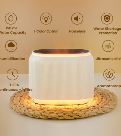 Black electric aroma diffuser with orange LED flame-effect mist.