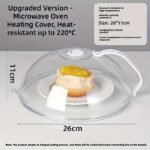 Two clear microwave food box covers over plates of broccoli and salad on a wooden table.