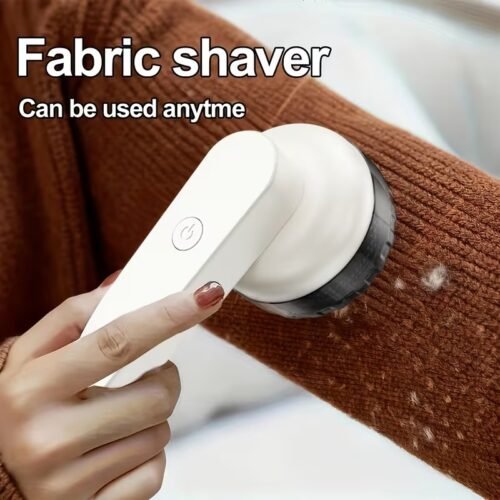 Handheld electric fabric shaver with six stainless steel blades and ergonomic grip for lint removal.
