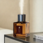 Luxury 200ml transparent reed diffuser bottle with black reeds on a modern table