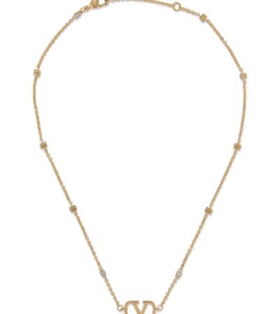 Close-up of Valentino Garavani Mini VLogo pendant with Swarovski crystals on a metal chain.