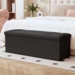 ZETDIY 43-inch black faux linen storage ottoman bench at the foot of a bed