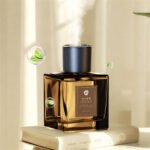 Luxury 200ml transparent reed diffuser bottle with black reeds on a modern table