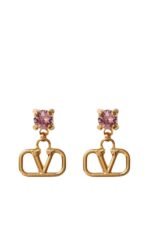 Close-up of Valentino Garavani VLogo earrings in gold-tone metal with rhinestones
