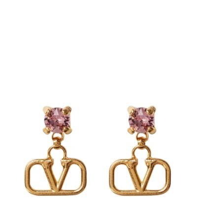 Close-up of Valentino Garavani VLogo earrings in gold-tone metal with rhinestones