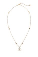 The Valentino Garavani VLogo Signature necklace featuring a pearl and Swarovski crystal pendant on a gold-tone chain.