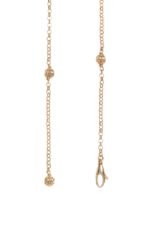 The Valentino Garavani VLogo Signature necklace featuring a pearl and Swarovski crystal pendant on a gold-tone chain.