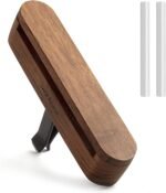 Round wooden car essential oil diffuser with magnetic lid and silicone-protected vent clip.