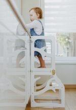 Convertible 3-in-1 kids learning tower shown in stool, desk, and slide positions made of natural birch plywood.