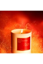 Maison Francis Kurkdjian Baccarat Rouge 540 luxury candle with a red and gold label.