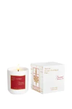 Maison Francis Kurkdjian Baccarat Rouge 540 luxury candle with a red and gold label.