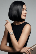 A close-up of Emporio Armani Mia 32mm watch with leather strap and stainless steel case