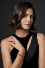 Saint Laurent Cassandre Chain Bracelet in polished brass featuring the YSL monogram.