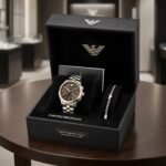 Emporio Armani men's two-tone chronograph watch and gold-tone logo bracelet set.