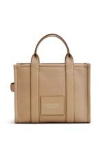 Marc Jacobs The small tote bag in camel full-grain leather with top handles.