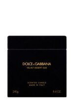 A luxury black glass candle featuring the Dolce & Gabbana Velvet Desert Oud label, presented in a velvet box.