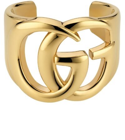 Gucci GG Marmont Cuff Bracelet in polished brass featuring the Double G logo.
