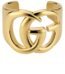 Gucci GG Marmont Cuff Bracelet in polished brass featuring the Double G logo.