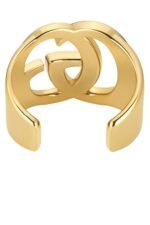Gucci GG Marmont Cuff Bracelet in polished brass featuring the Double G logo.
