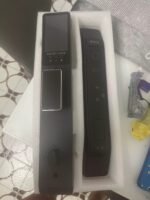 smart door lock featuring 3D face recognition, fingerprint sensor, and built-in camera.