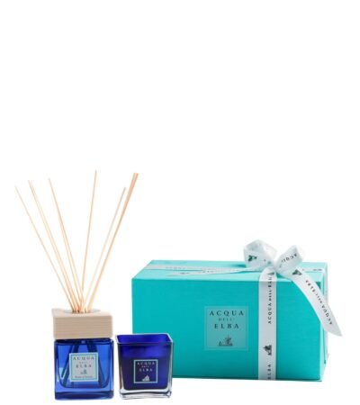 Acqua dell’Elba Notte d’Estate home diffuser and candle in deep blue glass bottles.