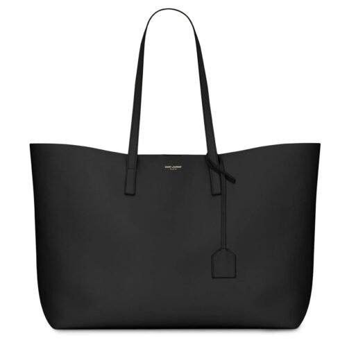 Saint Laurent East/West black leather tote bag with gold YSL charm and detachable pouch.