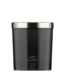 A minimalist black glass Jo Malone London Myrrh & Tonka Home Candle on a neutral background.