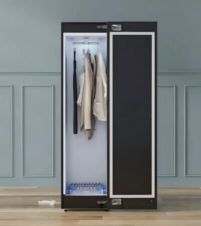 Freestanding smart clothing care wardrobe with digital touch interface.