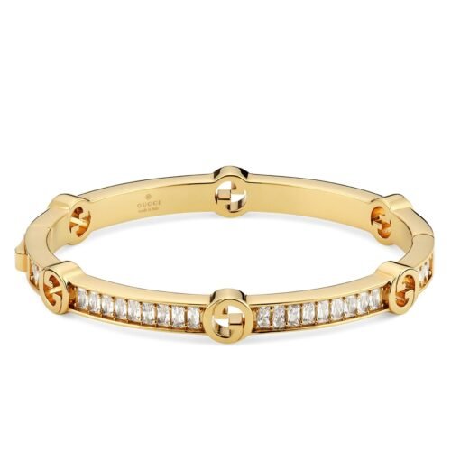 Gucci Blondie Crystal Bangle Bracelet in gold-toned brass with interlocking G logo.
