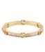 Gucci Blondie Crystal Bangle Bracelet in gold-toned brass with interlocking G logo.