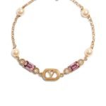 Valentino Garavani Ovalette bracelet in gold-finish metal with pearls and Swarovski crystals.
