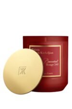The Maison Francis Kurkdjian Baccarat Rouge 540 candle in an elegant frosted red glass jar.