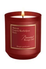 The Maison Francis Kurkdjian Baccarat Rouge 540 candle in an elegant frosted red glass jar.