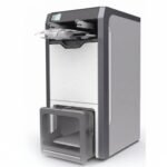 The Foldimate automatic clothes folding machine with neatly folded shirts.