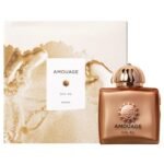 Elegant glass bottle of Amouage Dia Woman Eau de Parfum with a rose-gold cap.