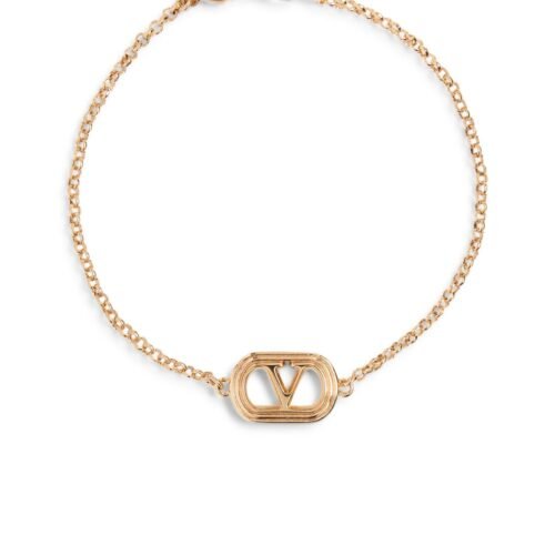 Valentino Garavani Ovalette gold-tone bracelet featuring a Swarovski pearl and VLogo emblem.