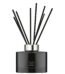 Dark glass Jo Malone London Velvet Rose & Oud diffuser with 10 rattan reeds.