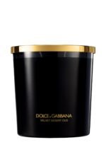 A luxury black glass candle featuring the Dolce & Gabbana Velvet Desert Oud label, presented in a velvet box.