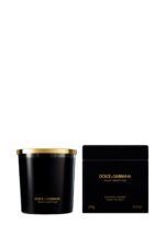 A luxury black glass candle featuring the Dolce & Gabbana Velvet Desert Oud label, presented in a velvet box.