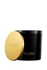 A luxury black glass candle featuring the Dolce & Gabbana Velvet Desert Oud label, presented in a velvet box.
